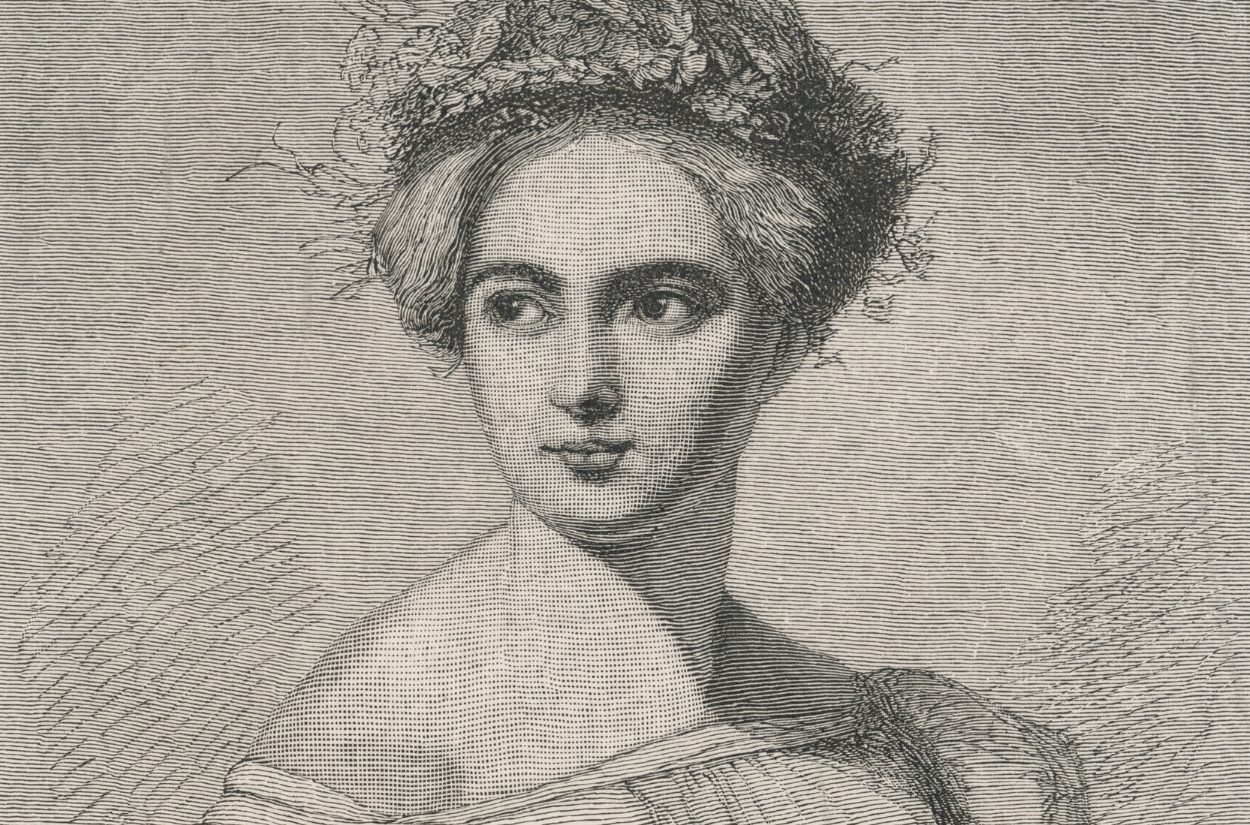 A detailed black and white engraving of a 19th-century woman with an ornate hairstyle and a floral headpiece. She gazes to the side with a serene expression, wearing an off-the-shoulder dress. The background is textured with fine lines.