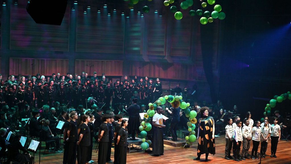 A panoramic photo of singers, orchestra and choir performing the OAE's The Fairy Queen: Three Wishes at the Queen Elizabeth Hall