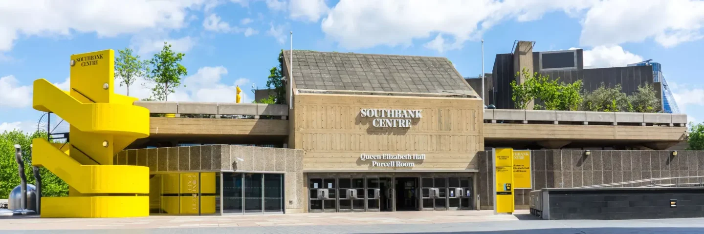 An external shot of the Queen Elizabeth Hall - a brutalist concrete building - at the Southbank Centre in London.