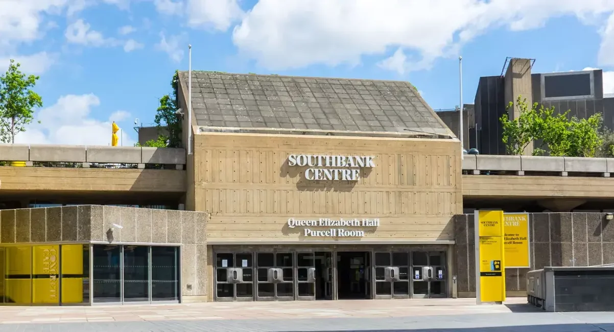 An external shot of the Queen Elizabeth Hall - a brutalist concrete building - at the Southbank Centre in London.